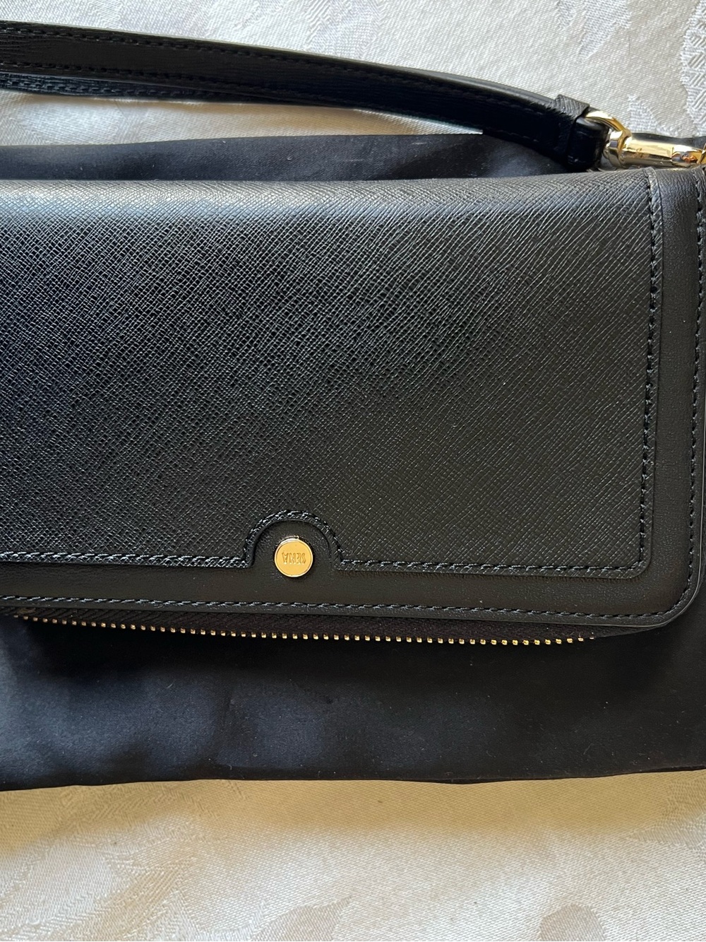 Elegant Black Leather Wristlet Clutch with Gold Accent